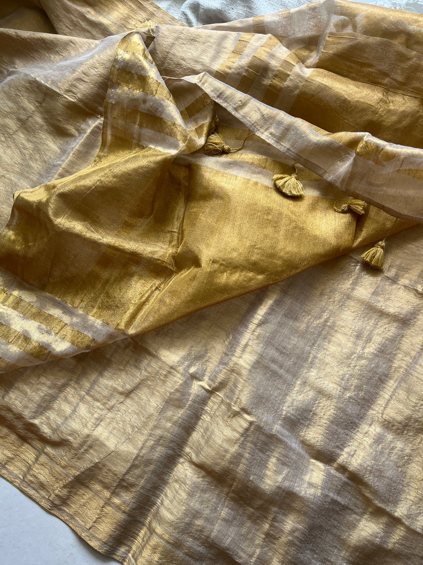 Swarna Golden Tissue Saree
