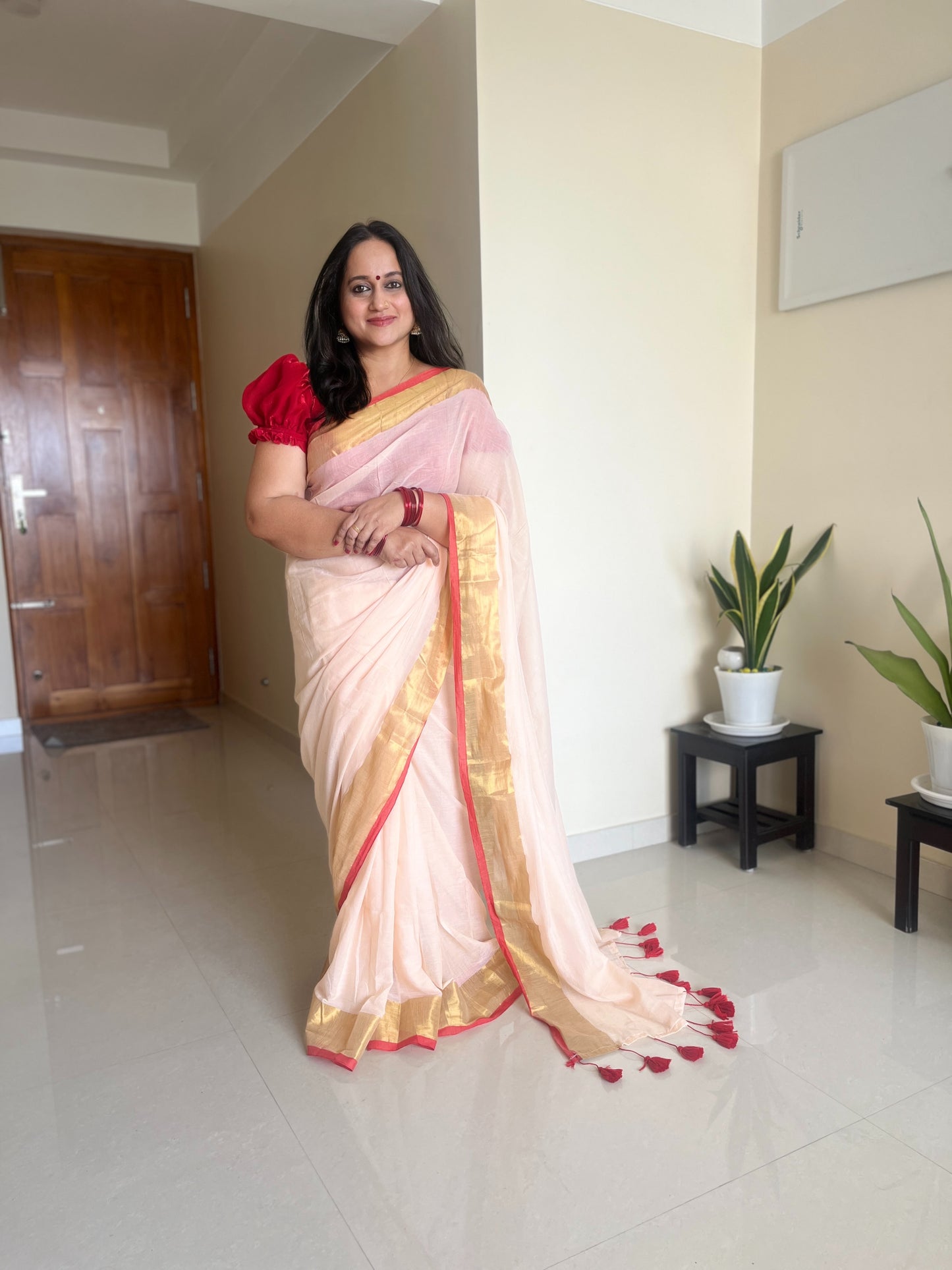 Manju – Mulcotton Saree with Red Border