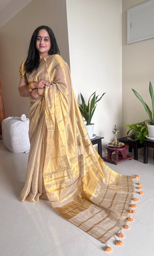 Swarna Golden Mul Tissue Saree