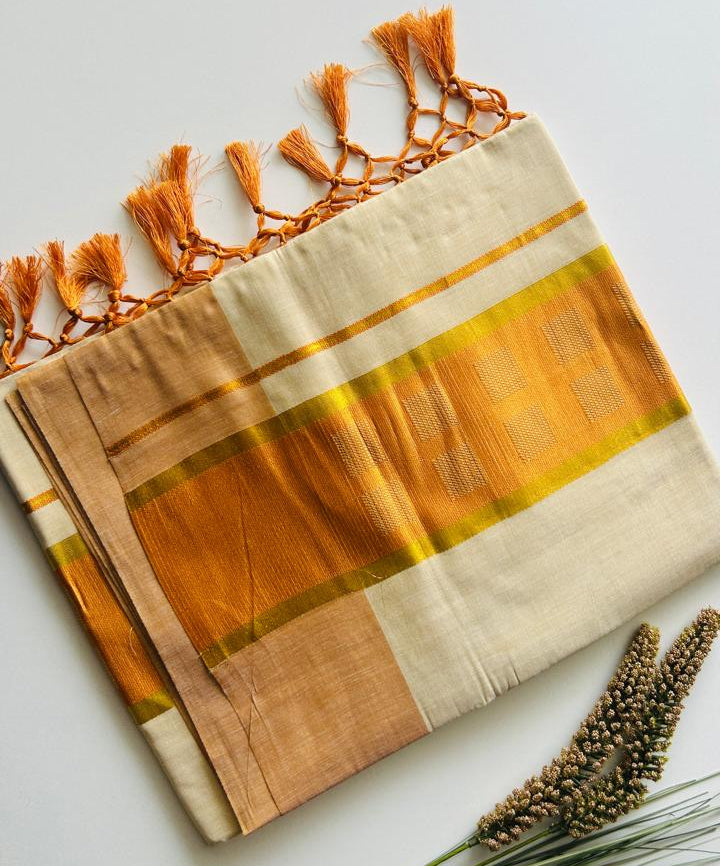 Kanakambari – Balaramapuram Kasavu Saree with Copper Orange Kasavu Border